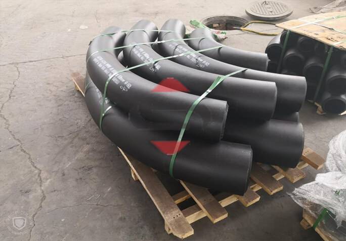 A Group Of Bluttweld Carbon Steel Bend On A Pallet